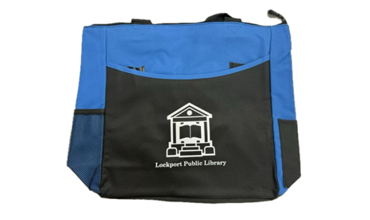 Blue tote bag with Lockport Public Library logo and name written in white on the black front pocket